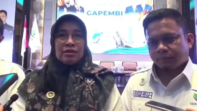 Pelaksana Harian (Plh) Deputi Sistem Tata Kelola Badan Gizi Nasional Ermia Sofiyessi dan Ketua DPW Gapembi Sulsel, Nurdin Beta. Foto Gapembi